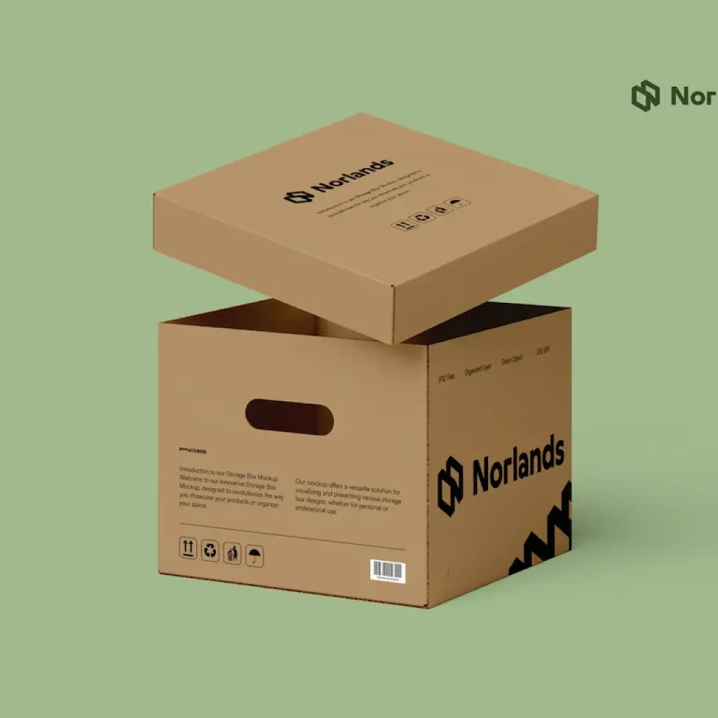 An eco-friendly Norlands cardboard storage box with a removable lid, displayed against a light green background. The box features cutout handles, printed icons, and the Norlands logo in bold black.