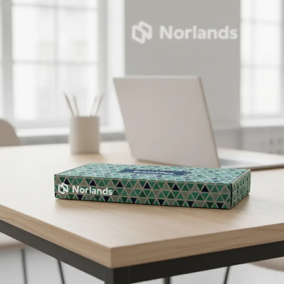 "Modern custom-printed Norlands box placed on a minimalist office desk, showcasing premium Custom Box Printing in Canada."
