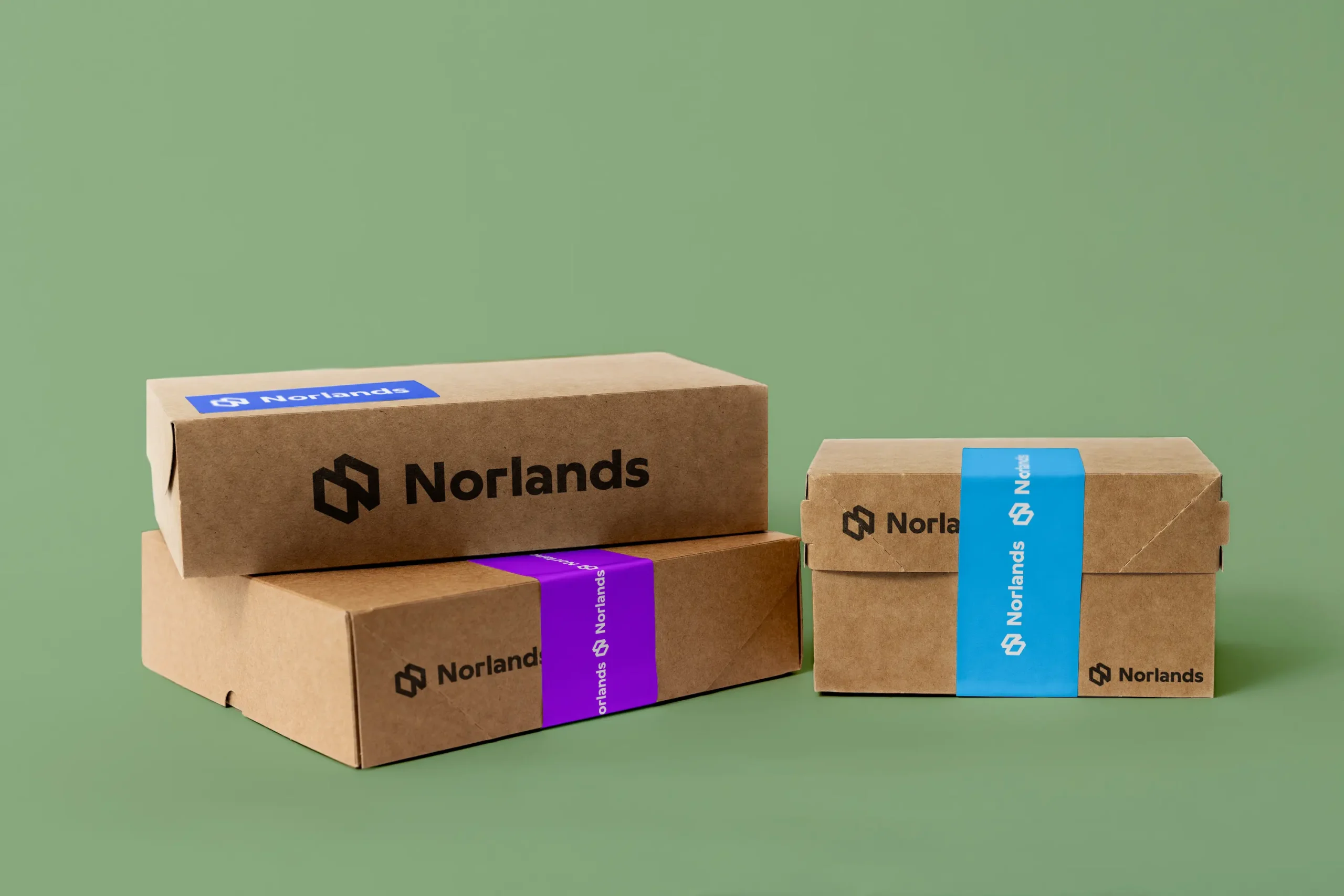 Custom branded cardboard packaging boxes Vancouver with colored sealing bands for secure shipping and product presentation